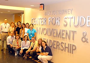 The Center for Student Involvement and Leadership staff pose outside of their offices in the Student Union Memorial Center.  The organization has been able to maintain its programs and clubs after the vote for a union fee failed to pass last semester.