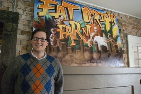 Valentina Martinelli / Arizona Daily Wildcat

Andrew Record, the general manager for Pasco Kitchen and Lounge stands in front of a commissioned work by local graffiti artist Roland.  The piece exemplifies Pasco's goal of mixing the comfort farm style with an urban flair.