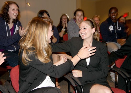 Ernie Somoza / Arizona Daily Wildcat

Newly elected senators Lindsay Hartgraves, left, a freshman majoring in English and history and Mary Myles, a freshman majoring in pre-business and Spanish, exchange congratulations after the announcement of the election results for ASUA senate in the Kiva room in the Student Union Memorial Center on March 10, 2010.
