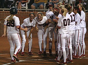 The No. 2 Arizona softball team celebrates the end of the top of the second inning in its last home game, an 8-3 loss to No. 1 UCLA April 9 at Hillenbrand Stadium. The Wildcats will return to Hillenbrand tonight to host a Tucson Regional for the 13th time in 15 years.