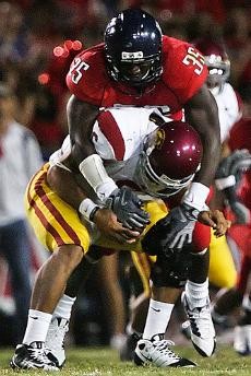 Sterling Lewis (35) sets himself up for a tackle in a 17-10 loss to then-No. 6 USC at Arizona Stadium on Oct. 25. Lewis was cited for multiple DUI charges Thursday morning and will not play in the Las Vegas Bowl on Dec. 20.