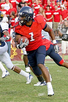 UA senior wide receiver Syndric Steptoe turns up field in a 24-20 win over California on Nov. 11 at Arizona Stadium. Steptoe, who led the team in receptions, is projected to go on the second day of the NFL draft. 