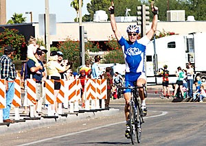 Flagstaff resident Michael Grabinger is the first to cross the finish line outside the Tucson Convention Center at the 24th Annual El Tour de Tucson Saturday morning. Grabinger, who rides for the Rideclean cycling team, won the 109-mile race in four hours, 15 minutes and 53 seconds.