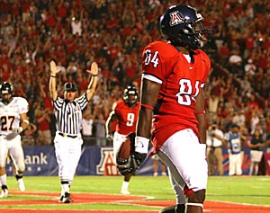 Terrell Turner celebrates in the end zone after catching a touchdown pass during Saturdays 45-24 win over NAU at Arizona Stadium. Reese caught one of five touchdowns passes in the game for the Wildcats, who will aim to duplicate the effort when they host New Mexico Saturday.
