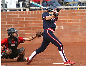 UA outfielder Caitlin Lowe swings at a pitch in Arizonas 8-1 win over Texas Tech Feb. 18 at Hillenbrand Stadium. Lowe and the rest of the Wildcats will compete in two exhibition games today and tomorrow against Phoenix and Pima colleges.
