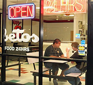 Criminal Justice sophomore Carlos Sanchex and Nick Hippa, 23, from Tucson have a late-night meal Friday at Los Betos, 914 E. Speedway Blvd.  Los Betos is open 24 hours and is a popular late-night eating location.