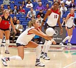 Junior libero Katie Jackels sets the ball in Arizonas four-set loss to No. 2 Washington Oct. 20 in McKale Center. The Wildcats meet the Huskies for a rematch tonight in Seattle at 8.