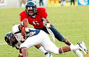 Junior cornerback Antoine Cason, top, tackles California tight end David Gray in Arizonas 24-20 win over the Golden Bears Saturday at Arizona Stadium. Cason took home his second consecutive Pac-10 Defensive Player of the Week award thanks to his 39-yard game-winning interception return for a touchdown. 