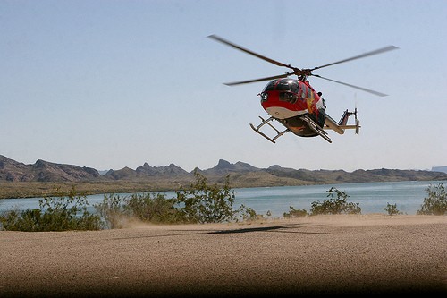 Ernie Somoza/ Arizona Daily Wildcat

Red Bull helicopter, one that can do flips and barrel-rolls, prepares for landing at the Nautical beach front resort in Lake Havasu, Arizona.