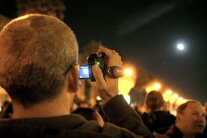 Using his camcorder, Peter Garami records the beginning of the lunar eclipse on the UA Mall last night.  This was the last total lunar eclipse until Dec. 21, 2010.