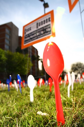 Gordon Bates / Arizona Daily Wildcat
Members of the University Activities Board placed hundreds of plastic spoons in the grass south of the Park Student Union in recognition of the many homeless and hungry residents of Tucson. The spoons are meant to announce the Rock For Hunger event, a concert meant to raise food, money and awareness for homeless, hosted by KAMP on Friday, March 26th.
