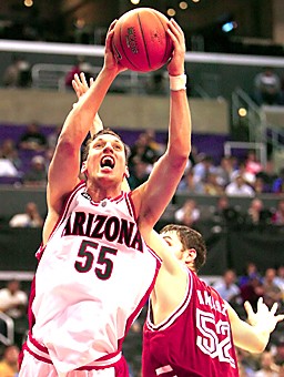 Arizonas Ivan Radenovic shoots past Stanfords Matt Haryasz during the second half of Arizonas second round Pac-10 Tournament game against Stanford, Thursday March 9, 2006 at the Staples Center in Los Angeles. Arizona beat Stanford 73-68, and will play tomorrow 7 p.m. MST. (Photo by Chris Coduto/Arizona Daily Wildcat)