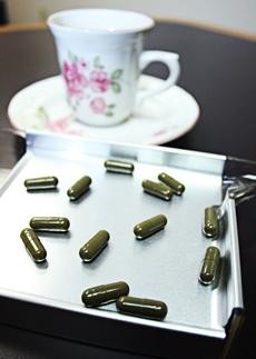 Researchers with the Arizona Cancer Prevention and Control Program at the UA have been experimenting with Polyphenon E, a green tea extract seen in the pill capsules above, to gauge their effects on women with cervical cancer. 