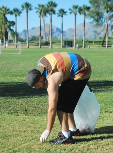 Valentina Martinelli/ Arizona Daily Wildcat

Coconino Residence Hall eco-rep Erik Delich, a psychology freshman, helps clean up Himmel Park on Sunday, Oct. 10. Eco-reps  from various campus dorms carpooled from the UA to help rid the park of trash in an effort to raise environmental awareness.