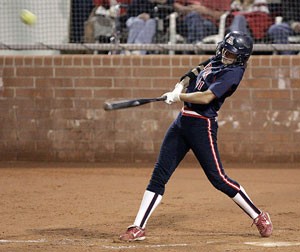 Arizona designated player Stacie Chambers crushes a home run in game two of the Wildcats doubleheader sweep of Marshall last night at Hillenbrand Stadium. Arizona won both games by a combined score of 20-6.