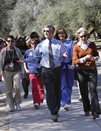 Lisa Beth Earle/ Arizona Daily Wildcat

President Shelton takes a walk around campus with UA employees on Monday, Feb.15 as part of the annual Walk Across Arizona campaign to promote physical fitness. The second annual walk with the President gave campus members an opportunity to have a casual chat with Shelton while getting some exercise.