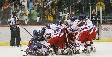 Arizona Icecat players celebrate a 4-3 seven-round shootout win against ASU Saturday night in the Tucson Convention Center. The Icecats ended their season above the .500 mark for the 29th time in 30 years.