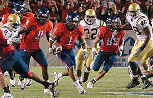 Syndric Steptoe takes it to the house on a 63-yard punt return in Arizonas 52-14 drubbing of UCLA on Nov. 5 at Arizona Stadium. The Wildcats will need Steptoe to step up if Arizonas attack can keep up with Brigham Youngs high-powered offense. 