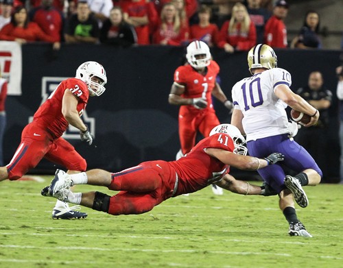 Mike Christy / Arizona Daily Wildcat

The No. 15 Arizona Wildcats hosted the Washington Huskies in a Pacific 1o Conference matchup Saturday, Oct. 23, 2010 at Arizona Stadium in Tucson, Ariz. The Wildcats rolled to a 44-14 behind backup quarterback Matt Scott.