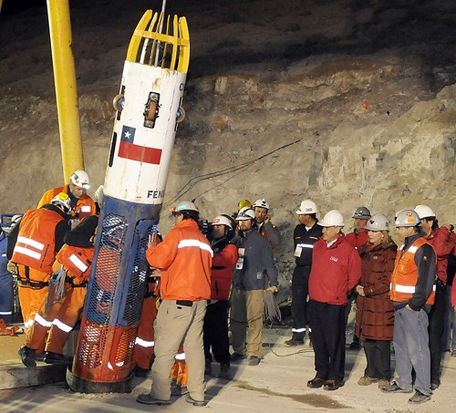 The capsule carries Manuel Gonzalez, a rescue specialist, into the San Jose mine, near Copiapo, Chile, on October 13, 2010, to aid in the rescue of the 33 miners trapped in the mine for 70 days. (Alex Ibanez/Handout/MCT/Abaca Press)