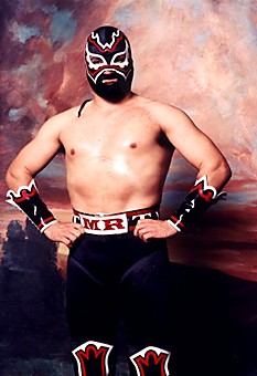 This is an actual WWF-style wrestler from Mexico. To learn more about this phenomenon, go to the showing of Lucha Libre - Its Role in Mexican History and Popular Culture tomorrow night from 7 to 9 at the Center for English as a Second Language Auditorium. 