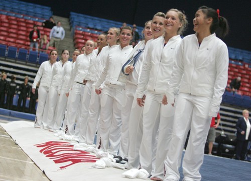 Mike Christy / Arizona Daily Wildcat

The UA gymnastics team ended their home season with a third straight win against No. 24 Minnesota 196.175 to 193.700 Friday night in McKale. Senior Sarah Tomczyk placed second overall in last home meet of her career.