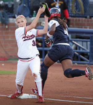 Arizona first baseman Sam Banister corrals the ball for an out in the 16-0 loss against the U.S. Olympic team at Hillenbrand Stadium Feb. 19. Banister and the rest of the Wildcats face off against the Canadian Olympic team in a doubleheader today starting at 4 p.m. at Hillenbrand Stadium.