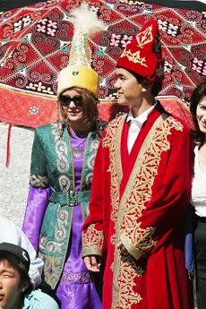 Yerbolat Zhumakhmetov, finance senior and Kazakh native, and Deidre Lyons, a pre-communications freshman, are faux-married in the Kazakh custom Wednesday morning at the Learning Services Building as part of an educational celebration of Kazakh culture and Nauryz, the upcoming Kazakh new year. 