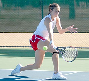 UA senior Kasia Jakowlew hits a backhand during a doubles match Friday at Robson Tennis Center. Jakowlew and freshman Natalia Toporowska lost the match 8-3, but the No. 48 Wildcats still beat No. 56 Washington State 6-1 before taking down Washington 5-2 Saturday.