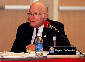Regent Dennis DeConcini speaks about next years student tuition proposal to other regents and university students, faculty and staff at the Arizona Board of Regents meeting yesterday afternoon in the Student Union Memorial Center North Ballroom. DeConcini voted for the student proposal and against the 5 percent tuition proposal that passed yesterday.