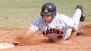 Arizona second baseman Colt Sedbrook dives for a base during the Wildcats weekend series against Loyola Marymount. Sedbrook, a junior, is one of three Wildcats from a junior college who are starting for Andy Lopezs team this season.