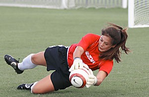 Sophomore goalie Chelsea McIntyre saves a shot in practice Tuesday at Murphey Field. With starting goalie McCall Smith out for the year with a knee injury, McIntyre will begin the season as a starter.