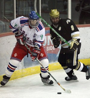 Icecat forward Robbie Nowinski works past Colorados Andrew Gillis during one of two Colorado wins at the Tucson Convention Center last weekend. Arizona takes Colorado State, a team that already swept the Buffaloes this season, in a two-game series this weekend at the TCC.