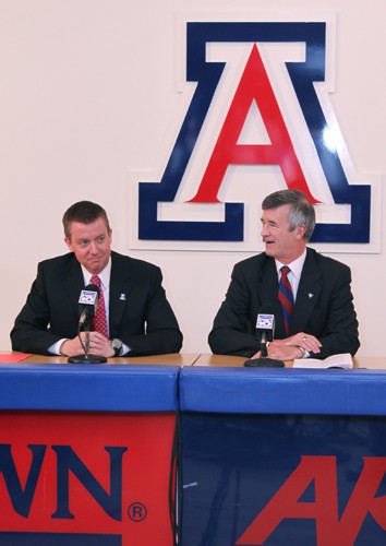 Lisa Beth Earle/ Arizona Daily Wildcat

Greg Byrne (left) formally announces his acceptance of  his new position as the next UA Director of Athletics at a press conference in the Lohse Room at the McKale Center on Wednesday, March 24. UA President Robert Shelton and Ernest Calder