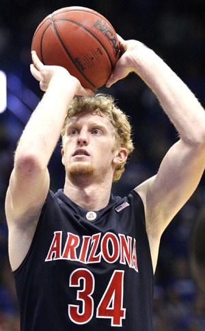 UA forward Chase Budinger sets himself up for a free throw ina 76-72 overtime loss at Kansas on Nov. 25. After testing the NBA Draft waters and working out for several NBA teams, Budinger pulled his name out of the draft on Monday and opted to return to Arizona for his junior season.