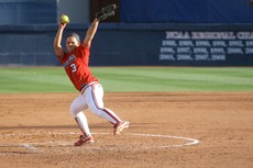 UA pitcher Sarah Akamine prepares to hurl the ball toward home plate during a 10-0 Arizona win against North Dakota State on Feb. 20 at Hillenbrand Stadium. The Wildcats face No. 21 Texas A&M in a three-game road trip starting tonight at 5 local time.