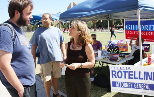 Ernie Somoza / Arizona Daily Wildcat

Felicia Rotellini, Attorney General candidate, discusses politics with Craig Johnson, 22, Philosophy senior, on the UA mall in front of Student Union Memorial Center on Thursday, Sept. 30. Rotellini has been an arizona prosecutor for the past 23 years.