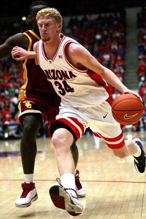 UA forward Chase Budinger drives around guard Lodrick Stewart in an 80-75 loss to USC in McKale Center on Feb. 15, 2007. Budinger said the Wildcats have confidence heading into Los Angeles that they didnt have last season.