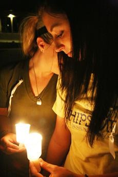 Sara Taylor rests her head on the shoulder of Jamie Furr during a candlelight vigil held as demonstration of solidarity against Proposition 8, which amended the California constitution to only recognize marriages between a man and woman. 
