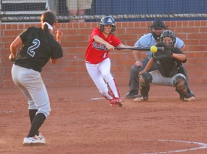 UA freshman outfielder Karissa Buchanan slaps at a pitch during the Wildcats 4-1 win over Yavapai College Saturday afternoon at Hillenbrand Stadium. Arizona went 2-0 in a doubleheader of exhibition games this weekend as it also beat Eastern Arizona College 3-0 in the night-cap.