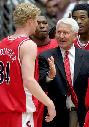 Arizona mens basketball head coach Lute Olson talks to his players during a timeout in an 81-66 loss to then-No. 5 UCLA on Feb. 17, 2007. Olson returned to work Monday after a season-long leave of absence.