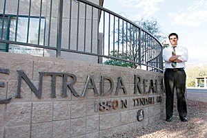 Kevin Bukata, the founder of www.UARentals.com and a 2005 graduate of the UA, stands outside one of the apartments listed on his Web site. Bukatas company helps students find off-campus housing. 