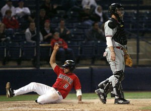 Arizona second baseman Colt Sedbrook slides home in the fourth inning of last nights 6-5 win over Nevada-Las Vegas at Sancet Stadium. Sedbrook also had an inside-the-park home run in the second inning, one of three Wildcat homers in the contest.