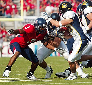 Junior cornerback Wilrey Fontenot prepares to make a tackle against California wide receiver Sam DeSa in Arizonas 24-20 win over the Golden Bears Saturday at Arizona Stadium. Fontenot made five tackles and had two pass breakups, including a crucial third-down deflection on the next-to-last play of the game. 