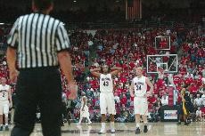 Arizona forwards Jordan Hill (43) and Chase Budinger (34) react to point guard Nic Wise fouling out in the final minutes of an 83-77 loss to California Thursday night in McKale Center. The Wildcats dropped to 18-12 overall and in the process put a severe dent in their NCAA Tournament chances.