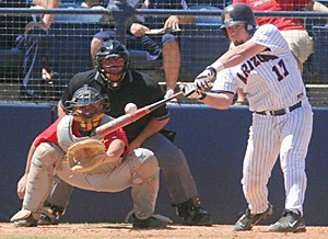 Arizona junior catcher Konrad Schmidt extends through a pitch in the Wildcats 7-5 win over Southern Utah at Sancet Stadium yesterday afternoon. The Wildcats swept the two-game, nonconference series after winning 18-0 on Tuesday.