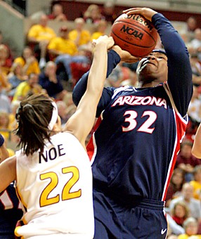 Claire C. Laurence/Arizona Daily Wildcat

Freshman forward Amina Njonkou gets fouled while driving to the basket over Arizona States Jill Noe during Saturdays 81-45 loss in Tempe.