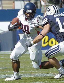 UA running back Chris Jennings carries the ball up field in Arizonas 20-7 loss at Brigham Young last Saturday. Jennings rushed for 42 yards against the Cougars, but he ran wild for 201 yards the last time the Wildcats faced a Division I-AA in Stephen F. Austin last year, which will be the case again when NAU heads to Arizona Stadium for tomorrows 7 p.m. contest.