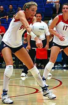 UA sophomore outside hitter Brooke Buringrud hits the ball in Arizonas four-set loss to No. 3 UCLA Friday in McKale Center. The Wildcats also lost to No. 4 USC on Saturday, but Buringrud finished the weekend with 29 kills.