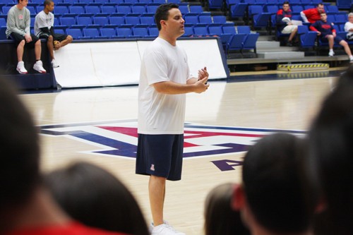 Arizona head basketball coach Sean Miller addresses the Zona Zoo student section last night at the ?Its Miller Time? event at McKale Center.  Miller introduced a new series of chants and also took questions for students